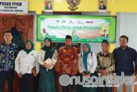 Foto Bersama Pertani HKTI jatim pada kegiatangiat 'Gerakan Segelas Beras (Gernas) untuk Disabilitas’ 