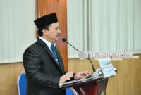 Foto. Kepala Bappeda Sumenep, Dr Ir, Arif Firmanto, S.TP., M.Si saat menyampaikan sambutan Usai Menerima Gelar Doktor dan Predikat Cumlaude. (Ist/nusainsider.com : Ach Toifur Ali Wafa) 