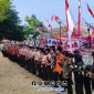 Foto. Aksi Bersih-bersih Pantai anggota Pramuka dari tingkat Penggalang, Penegak, hingga Pandega, bersama masyarakat dan mahasiswa Kuliah Kerja Nyata (KKN)