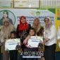 Foto. Anggota DPD/MPR RI, Dr Lia Istifhama, S.Sos.i., M.E.I Memakai Krudung Merah saat berkunjung ke SDN 13 Gresik, Rabu 19 November 2025.