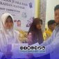 Foto. Az Syahra Nastiti Ramadhani, siswi kelas 1 SMP Integral Luqman Al-Hakim Sumenep saat menerima prestasi di pamekasan