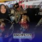 Foto. Tampak Wajah Anak Laki-laki (Malik) memakan Es Krim setelah lebih 40 menit hilang dari Pangkuan Kakaknya dalam Gelaran Madura culture Festival 4 2026