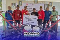 Foto. Penyerahan Bantuan Handtraktor dari SKK Migas - KEI kepada masyarakat kepulauan Sapeken, Jumat 9 Oktober 2026
